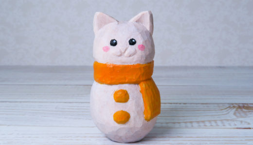木彫りの猫型雪だるま